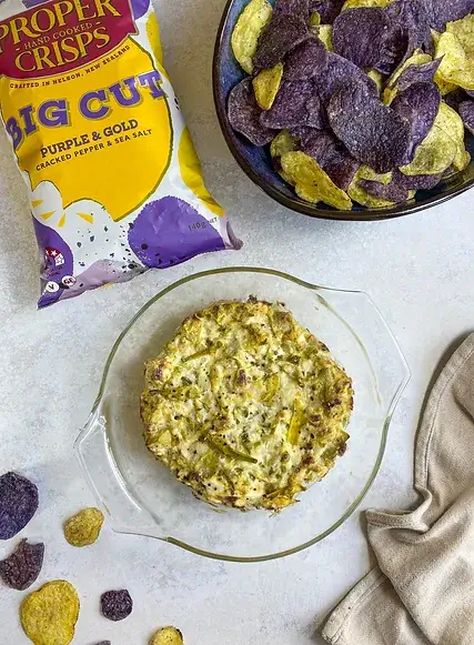 purple and gold cracked pepper and sea salt lifestyle image artichoke dip